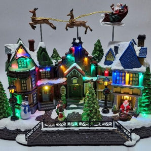 Village: 39cm(L) x 20cm(W) x 33cm(H) | Santa and Reindeer flying over village